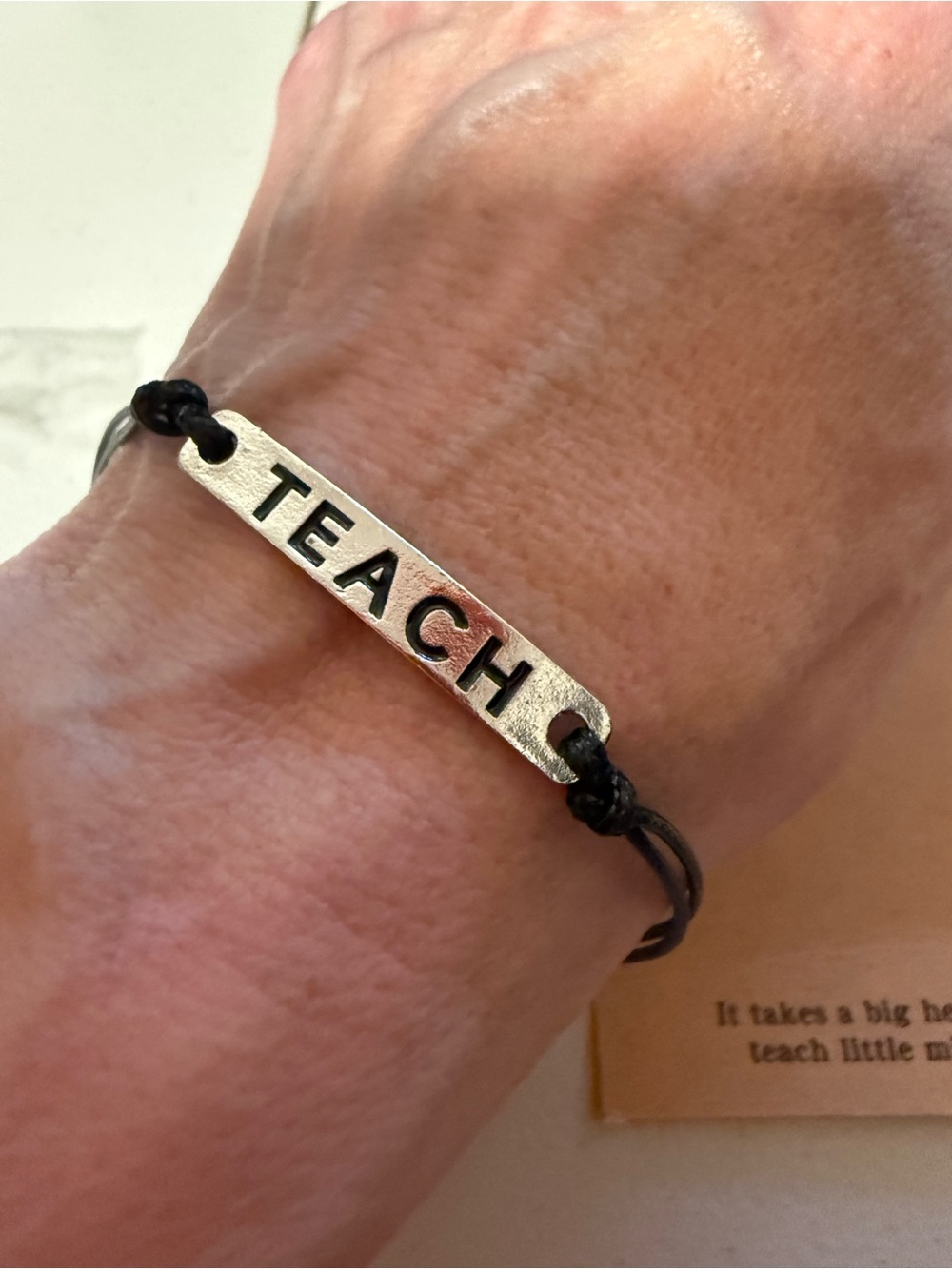 Silver 'TEACH' Bar Bracelet with Black Cord